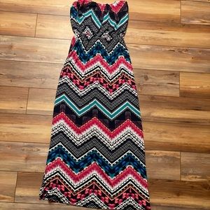 Strapless maxi dress. Cinched at the top.